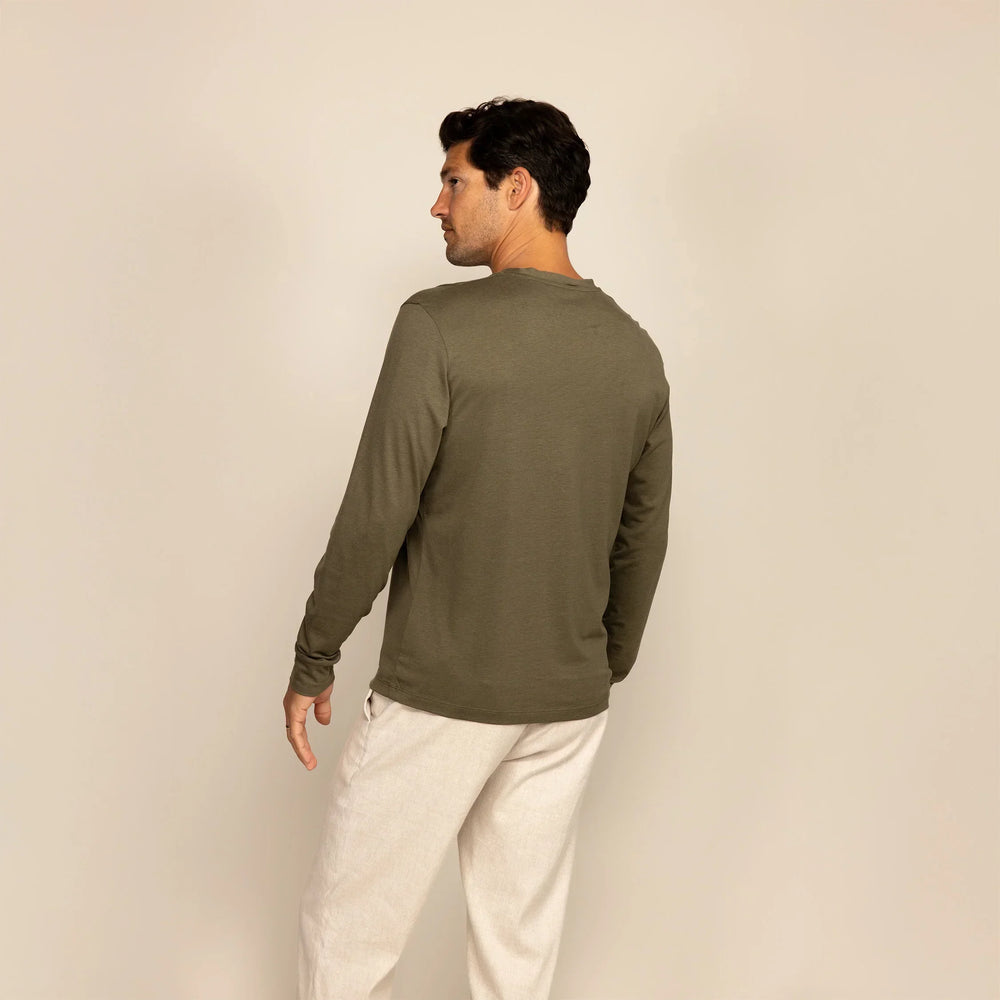 Man wearing a Long Sleeve Lyocell Blend
T-Shirt in Olive, rear view.