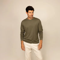 Man wearing a Long Sleeve Lyocell Blend
T-Shirt in Olive, front view.