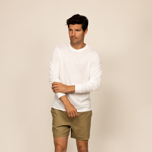 Man wearing a Marame Long Sleeve T-Shirt in White, front view.