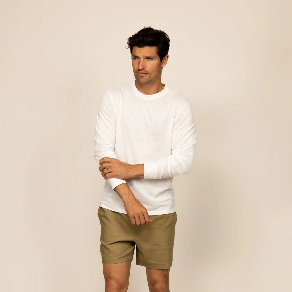 Man wearing a Marame Long Sleeve T-Shirt in White, front view.