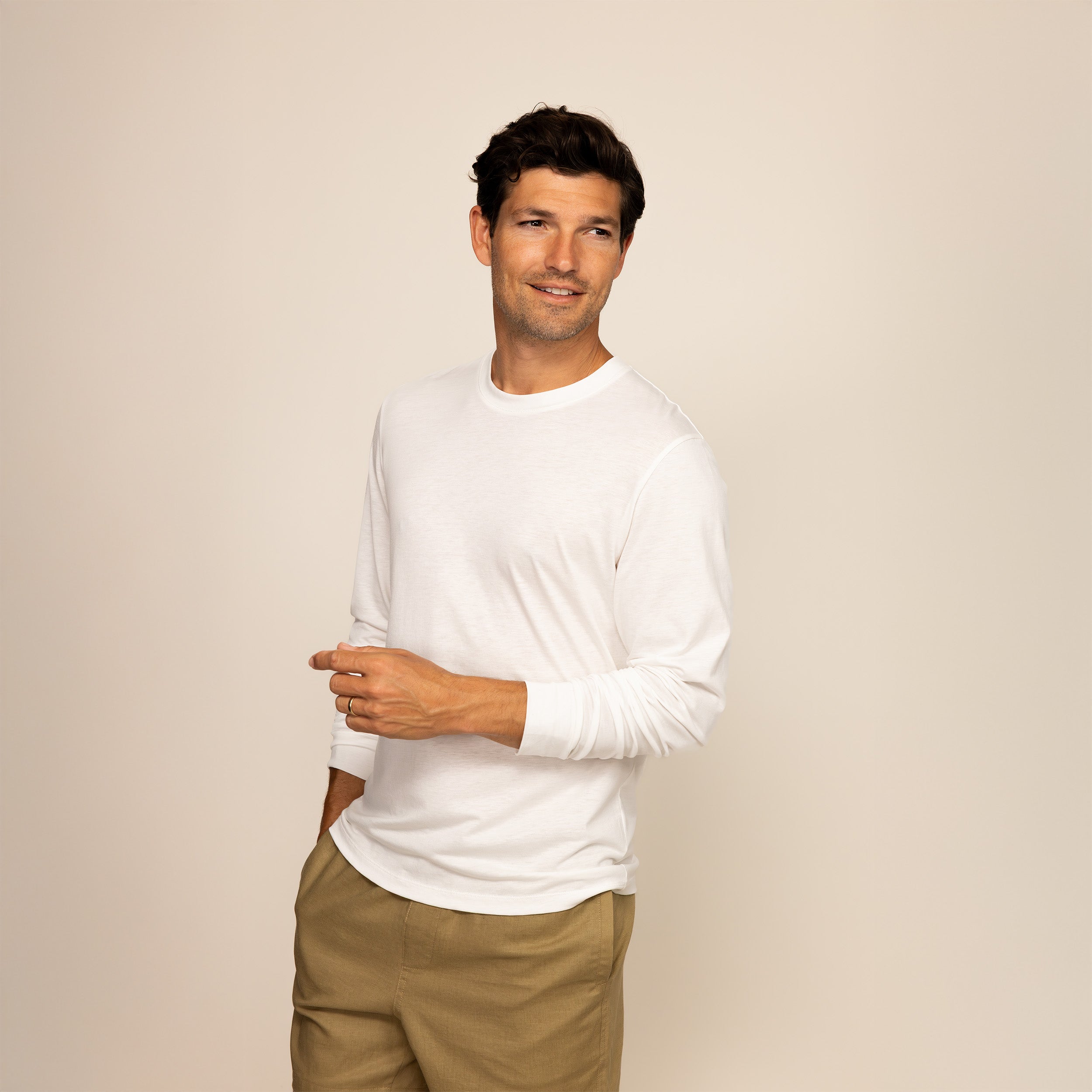 Man wearing a Marame Long Sleeve T-Shirt in White, front view.