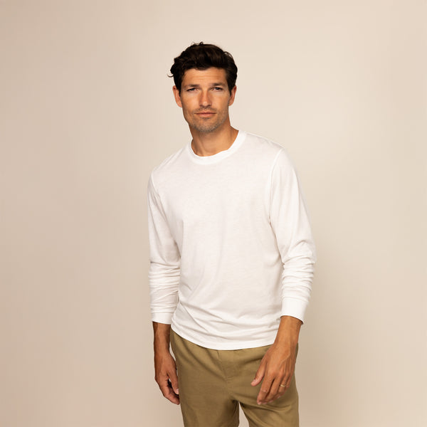 Man wearing a Marame Long Sleeve T-Shirt in White, front view.