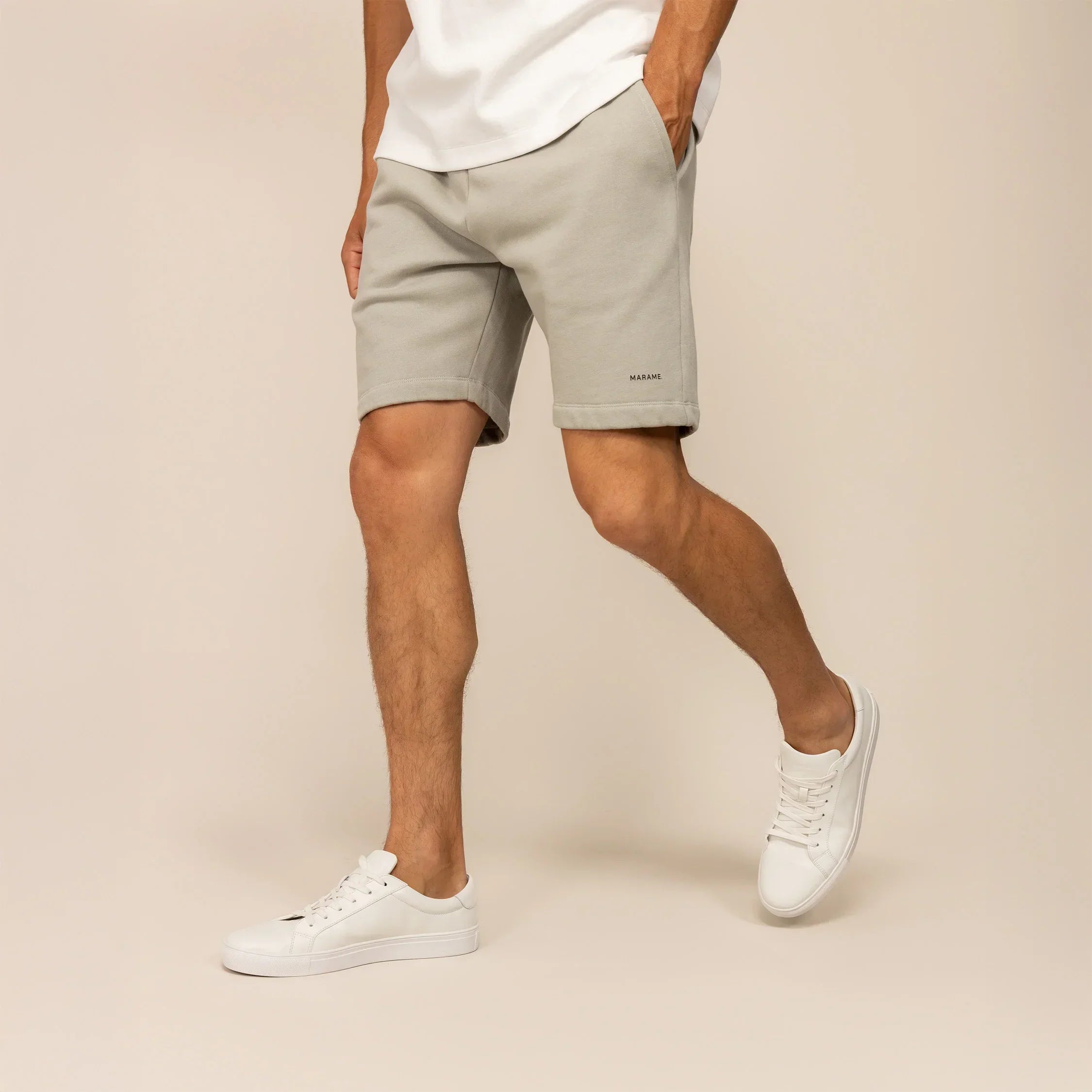 Man wearing Marame Lounge Shorts in Wolf Grey, front view. |Wolf Green
