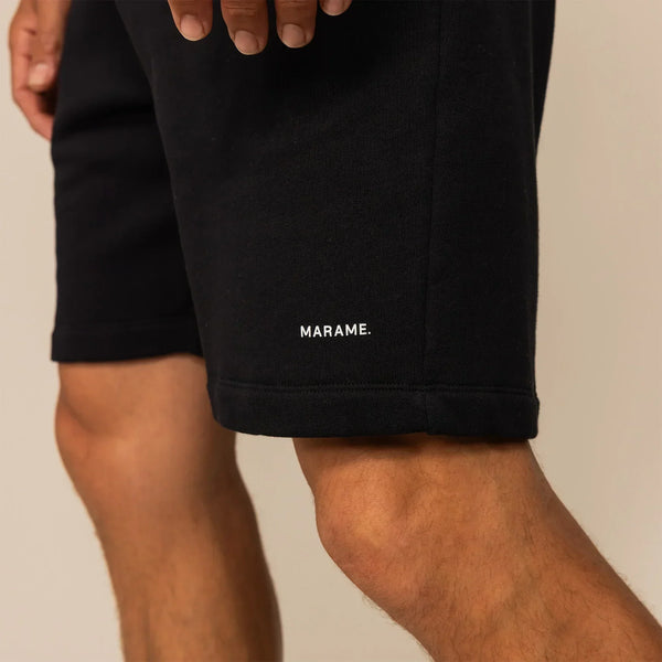 Man wearing Lounge Shorts in Black, closeup.