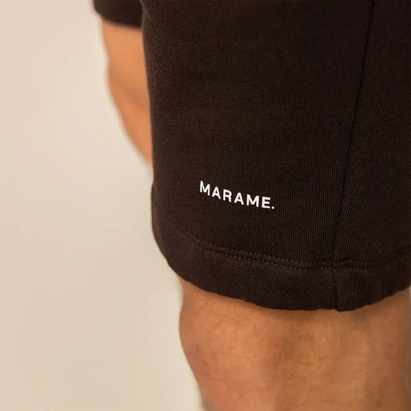 Man wearing Lounge Shorts in Smoked Brown, closeup. |smoked brown