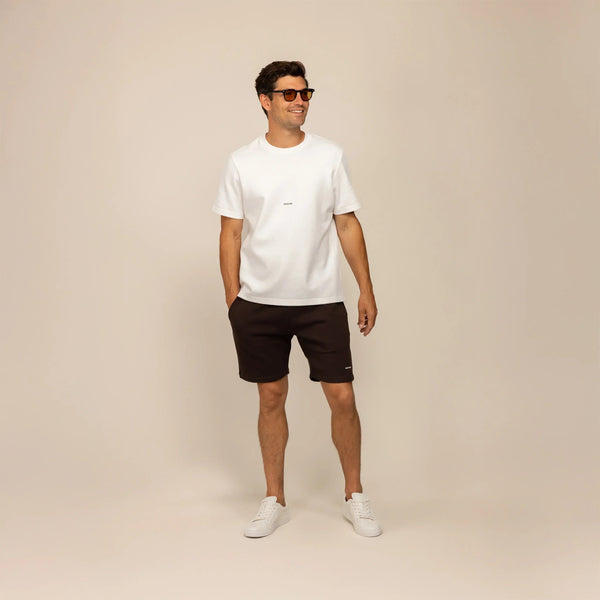 Man wearing Marame Lounge Shorts in Smoked Brown, front view. |smoked brown