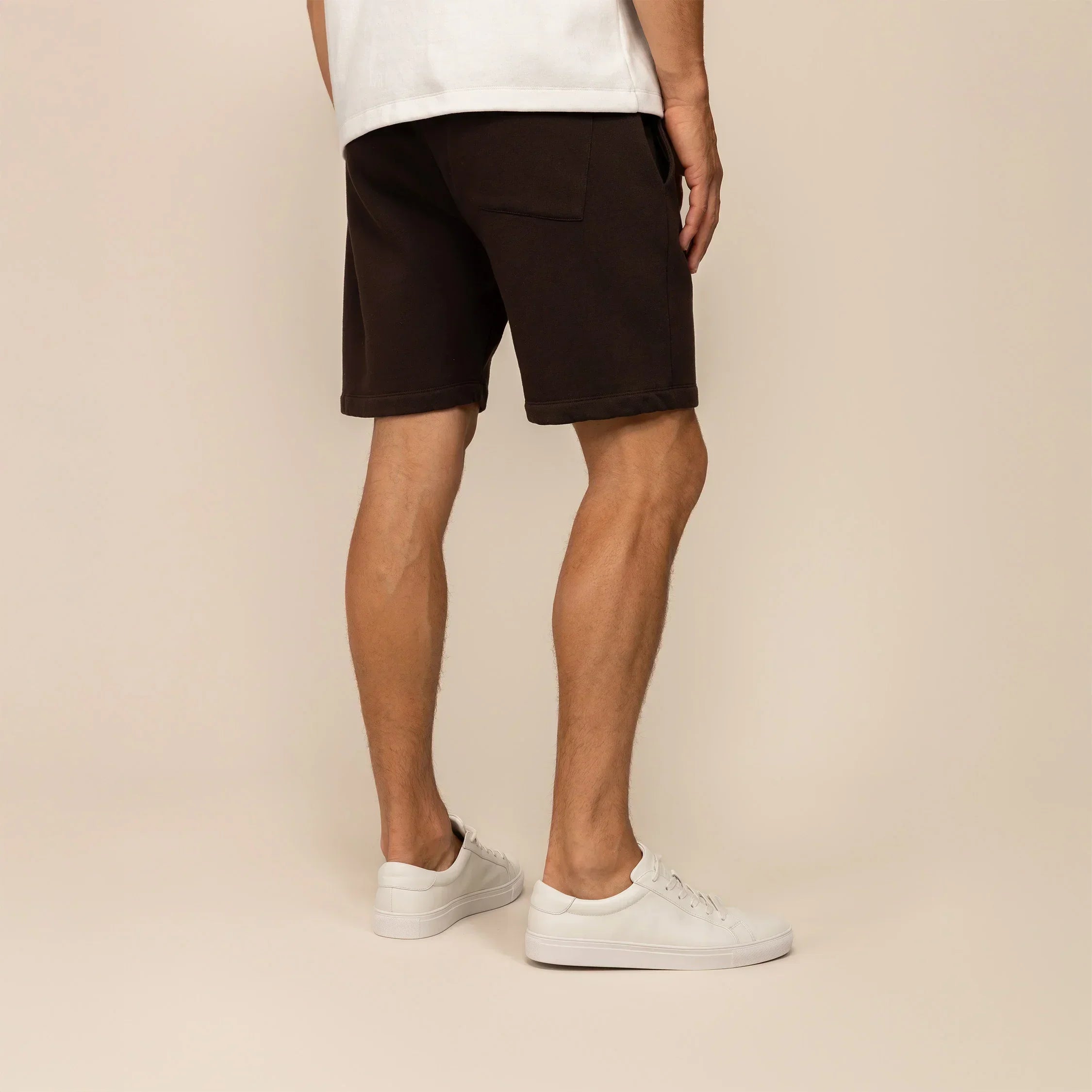 Man wearing Marame Lounge Shorts in Smoked Brown, rear view. |smoked brown
