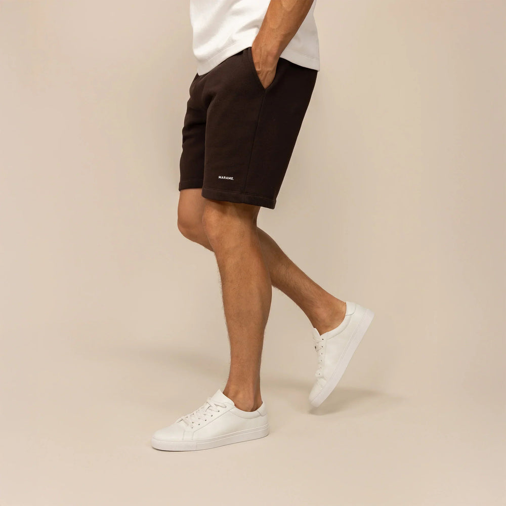 Man wearing Lounge Shorts in Smoked Brown, side view. |smoked brown