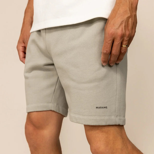 Man wearing Lounge Shorts in Wolf Grey, front view.