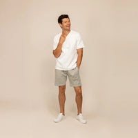 Man wearing Marame Lounge Shorts in Wolf Grey, front view. |Wolf Green