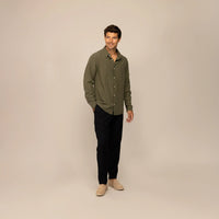 Man wearing Marame Lyocell/Linen Blend Casual Long Sleeve Shirt in Olive Grove, front view.