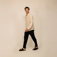 Man wearing Marame Lyocell/Linen Blend Casual Long Sleeve Shirt in Drift Beige, front view.