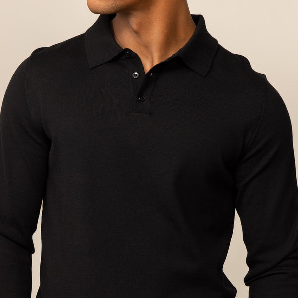 Man wearing a Marame Merino Cotton Long Sleeve Polo in Black, closeup.