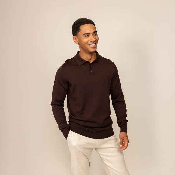 Man wearing a Marame Merino Cotton Long Sleeve Polo in Brown Cherry, front view.