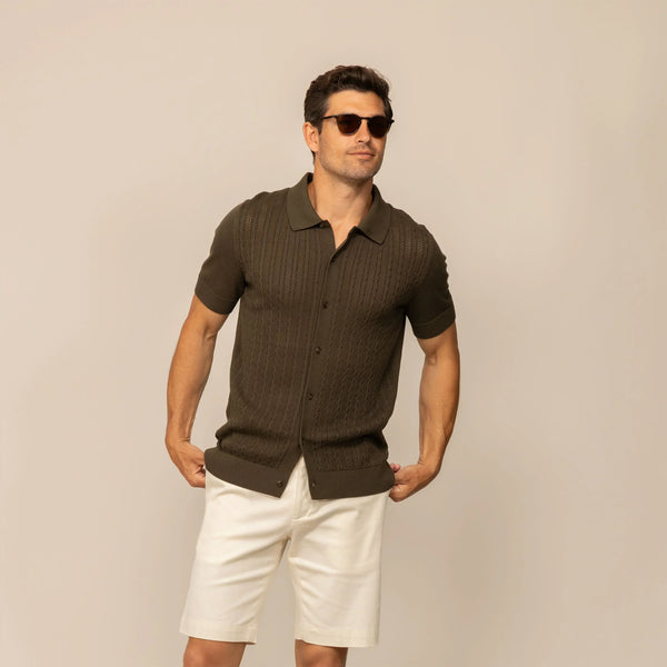Man wearing morning meadow cable knit short sleeve shirt, front view.