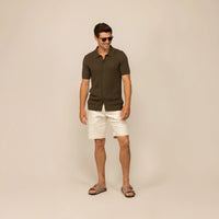 Man wearing morning meadow cable knit short sleeve shirt, front view.