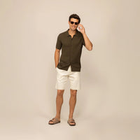 Man wearing morning meadow cable knit short sleeve shirt, front view. |morning meadow