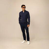 Man wearing a navy half zip jumper, front view. |navy