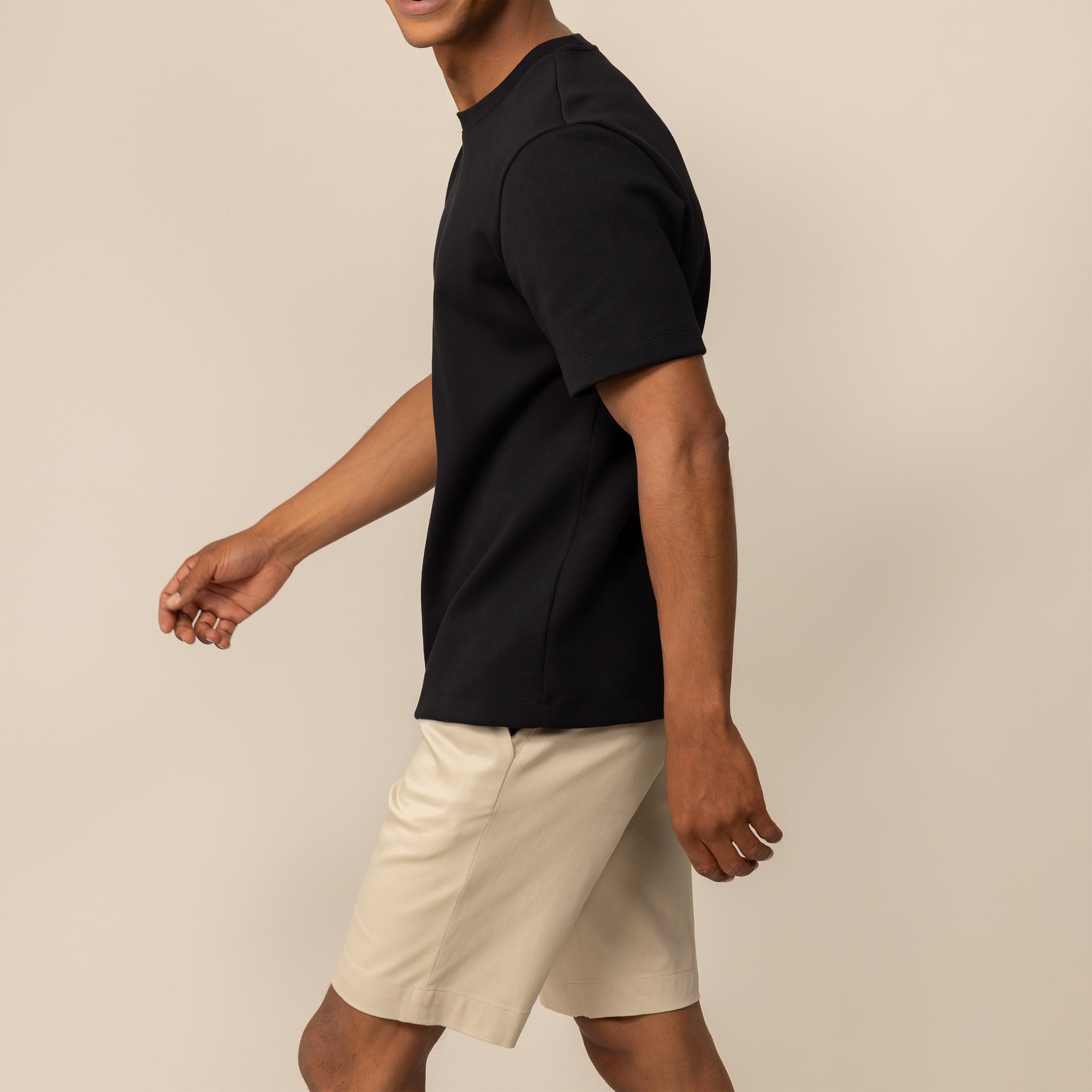 Man wearing a Marame Relaxed Fit Logo T-Shirt in Black, front view.