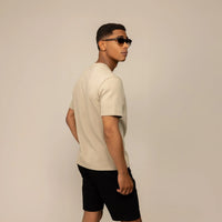 Man wearing a Relaxed Fit T-Shirt in Canyon Clay, rear view.  |Canyon Clay