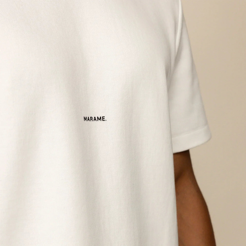 Man wearing a Relaxed Fit Logo T-Shirt in White, closeup.