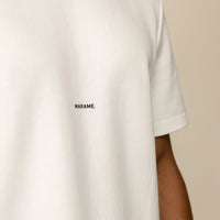 Man wearing a Relaxed Fit Logo T-Shirt in White, closeup.