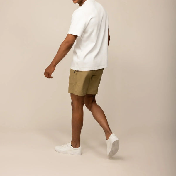 Man wearing a Relaxed Fit Logo T-Shirt in White, front view.