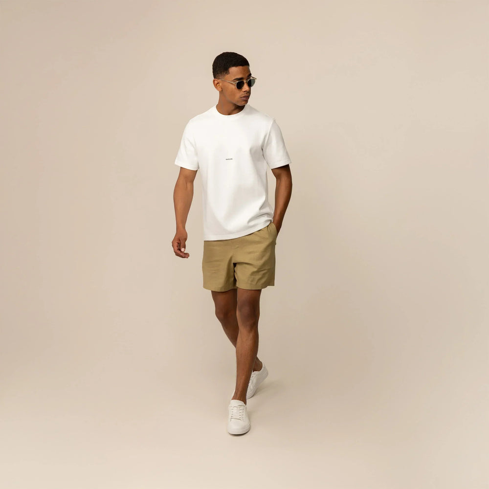 Man wearing a Marame Relaxed Fit Logo T-Shirt in White, front view. |White
