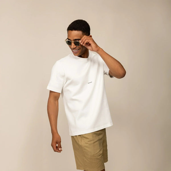 Man wearing a Marame Relaxed Fit Logo T-Shirt in White, front view. |White