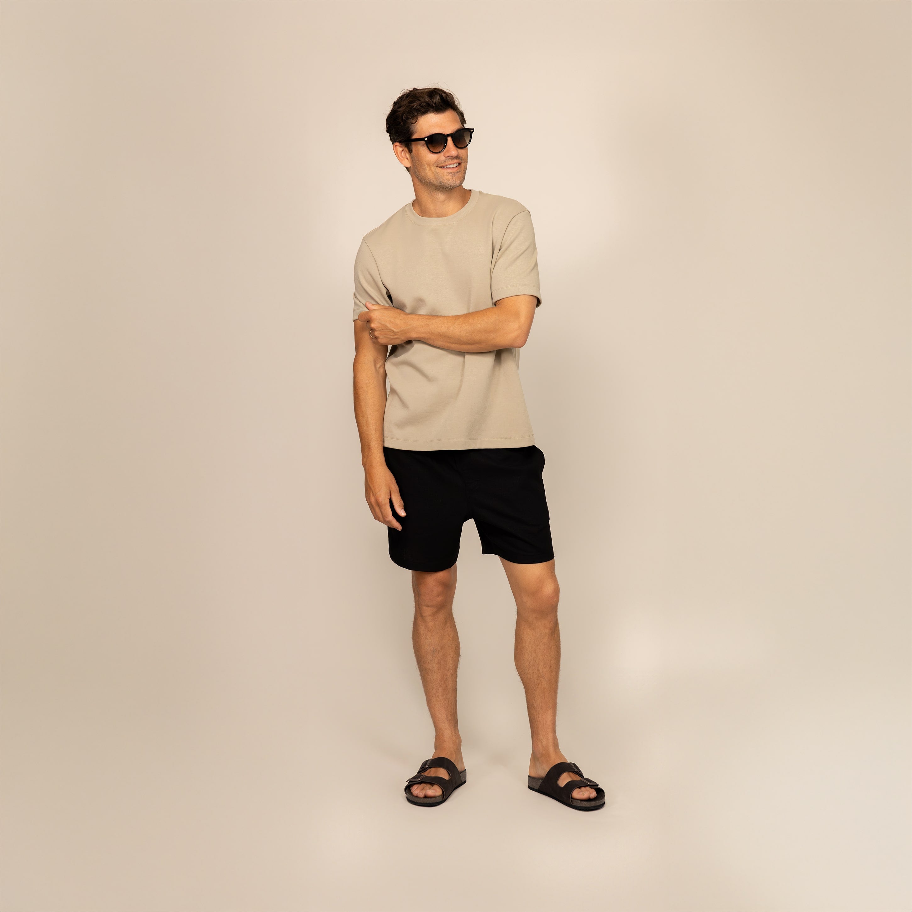 Man wearing a Marame Relaxed Fit T-Shirt in Canyon Clay, front view.