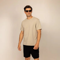 Man wearing a Marame Relaxed Fit T-Shirt in Canyon Clay, front view. |Canyon Clay