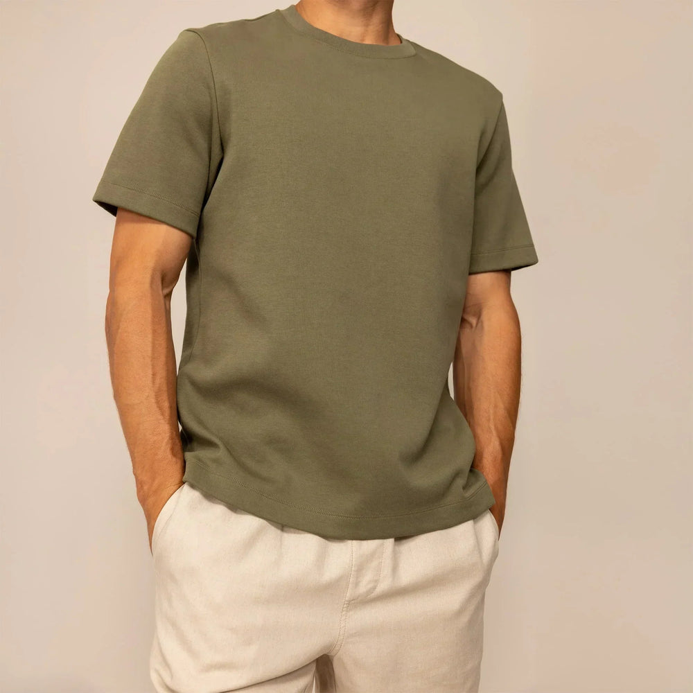 Man wearing a Marame Relaxed Fit T-Shirt in Olive, front view. |olive