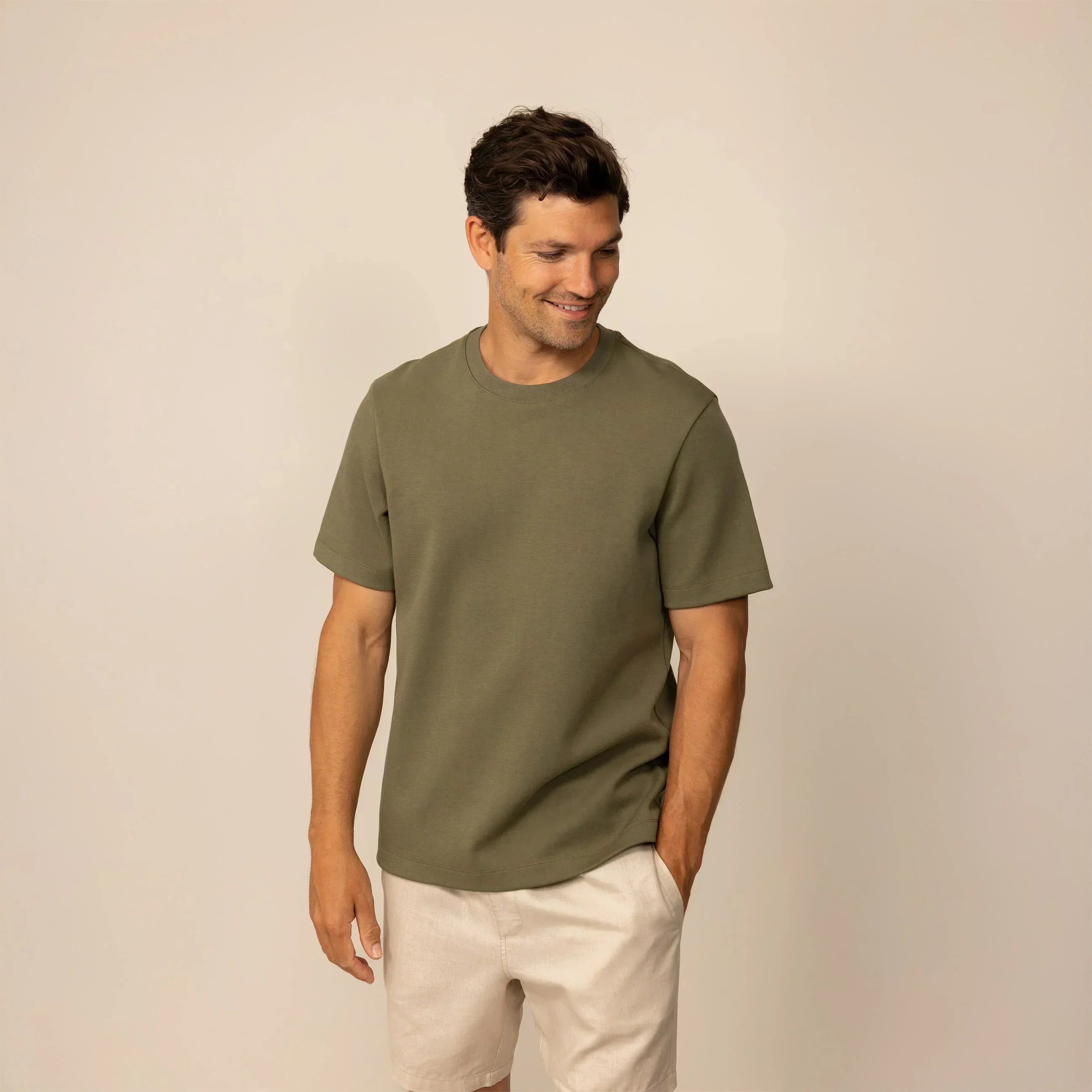 Man wearing a Marame Relaxed Fit T-Shirt in Olive, front view. |olive