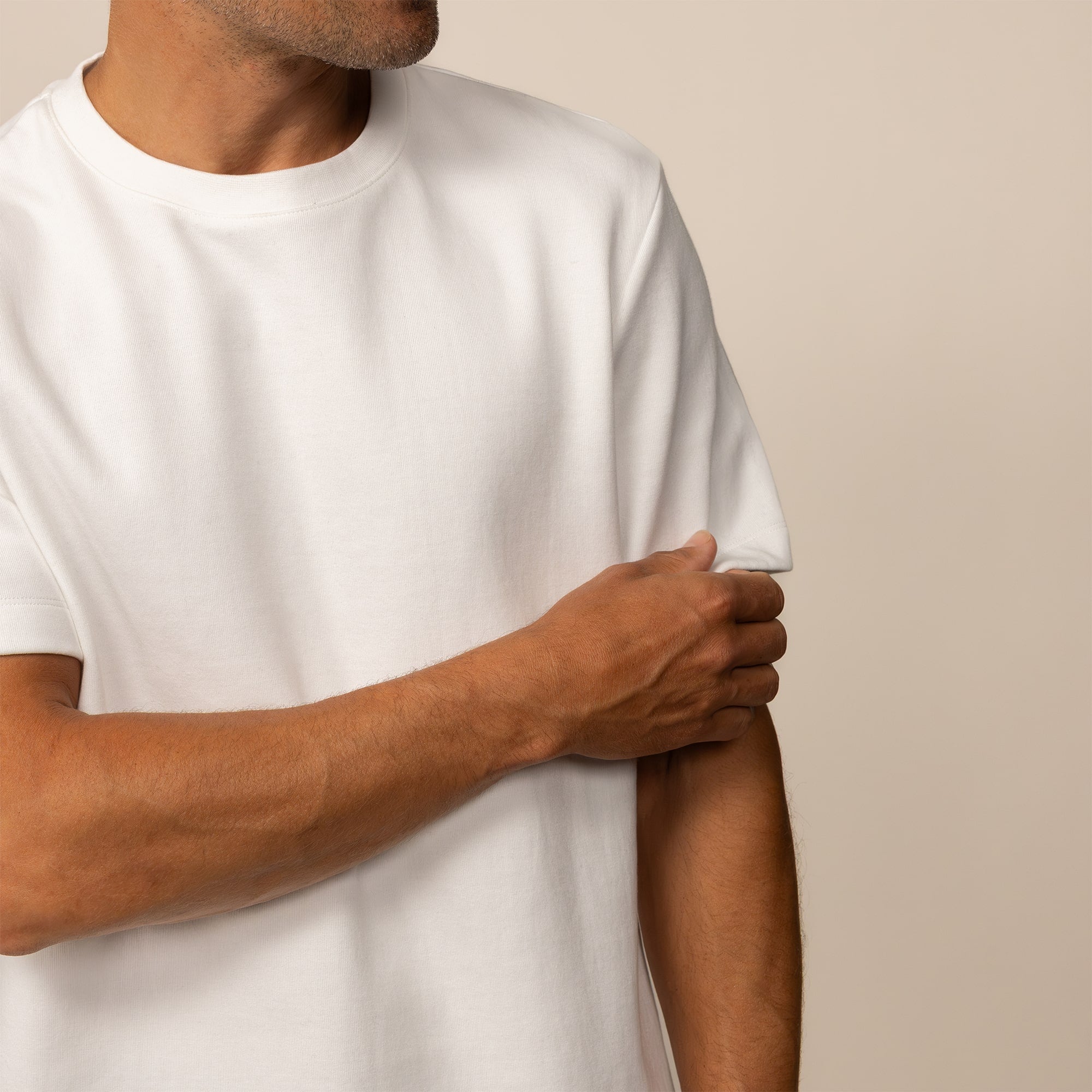 Man wearing a Relaxed Fit T-Shirt in White, front view.