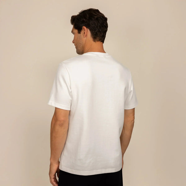 Man wearing a Marame Relaxed Fit T-Shirt in White, rear view. |White
