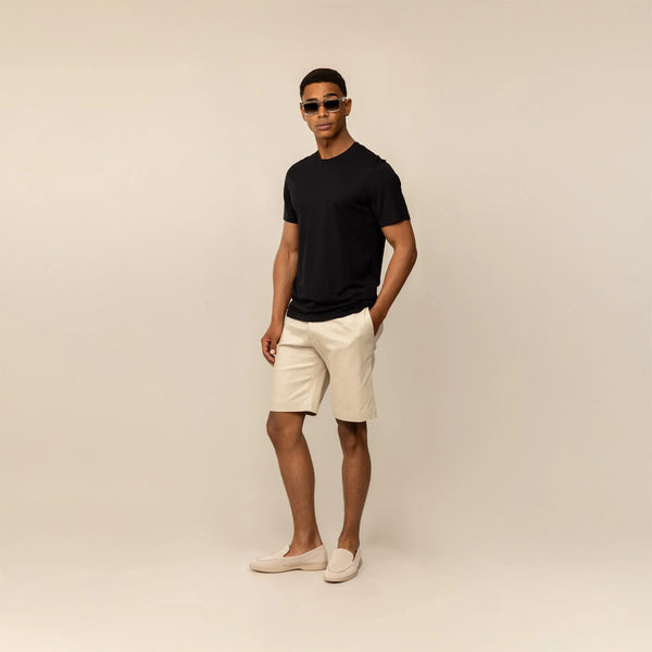 Man wearing a Marame Slim Fit Lyocell Blend T-Shirt in Black, front view.