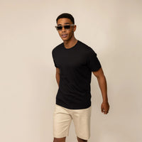 Man wearing a Marame Slim Fit Lyocell Blend T-Shirt in Black, front view. |Black