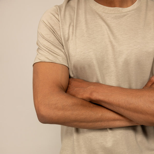 Man wearing a Marame Slim Fit Lyocell Blend T-Shirt in Canyon Clay, closeup.