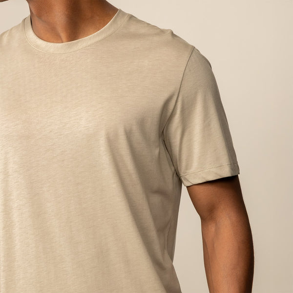 Man wearing a Marame Slim Fit Lyocell Blend T-Shirt in Canyon Clay, closeup.