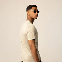 Man wearing a Marame Slim Fit Lyocell Blend T-Shirt in Canyon Clay, rear view.