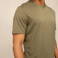 Man wearing a Marame Slim Fit Lyocell Blend T-Shirt in Olive, front view.