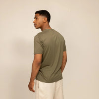 Man wearing a Marame Slim Fit Lyocell Blend T-Shirt in Olive, rear view. |Olive