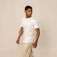 Man wearing a Marame Slim Fit Lyocell Blend T-Shirt in White, front view.