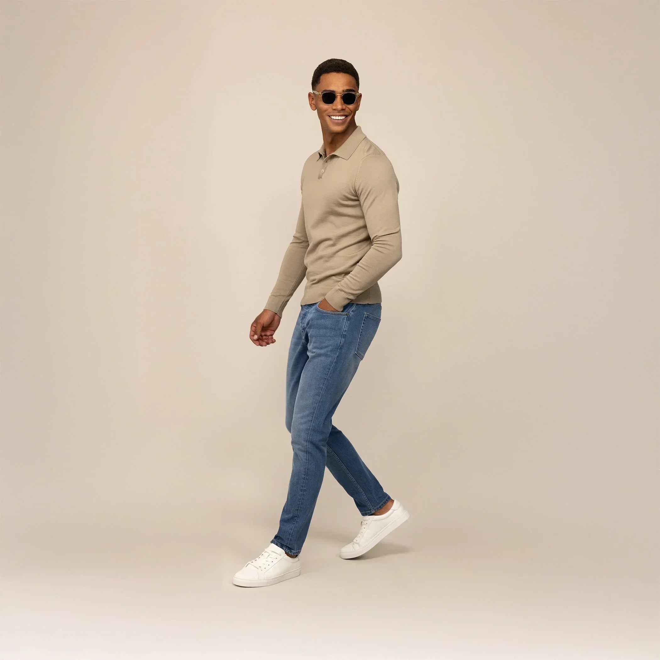Man wearing Marame Slim Leg Denim Jeans in Classic Wash, front view. |classic wash denim