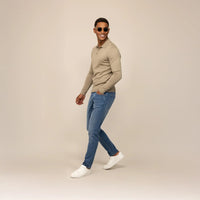 Man wearing Marame Slim Leg Denim Jeans in Classic Wash, front view. |classic wash denim
