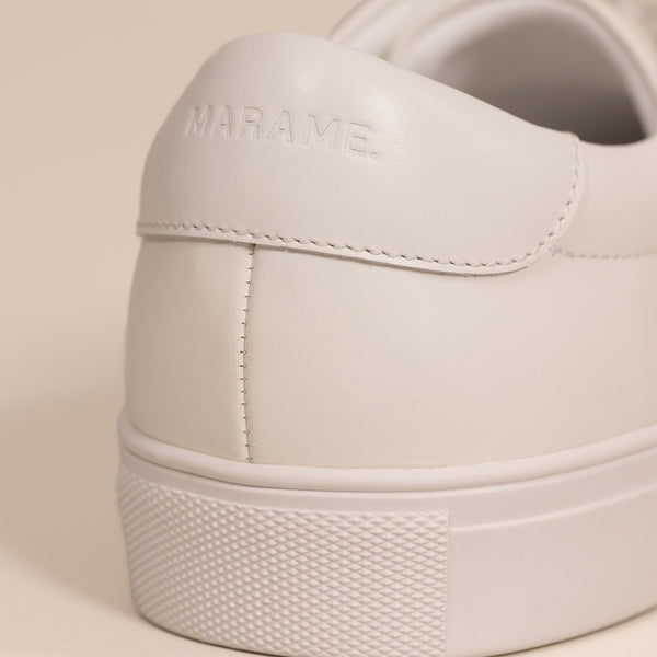 Smart Leather Trainers in White, closeup.