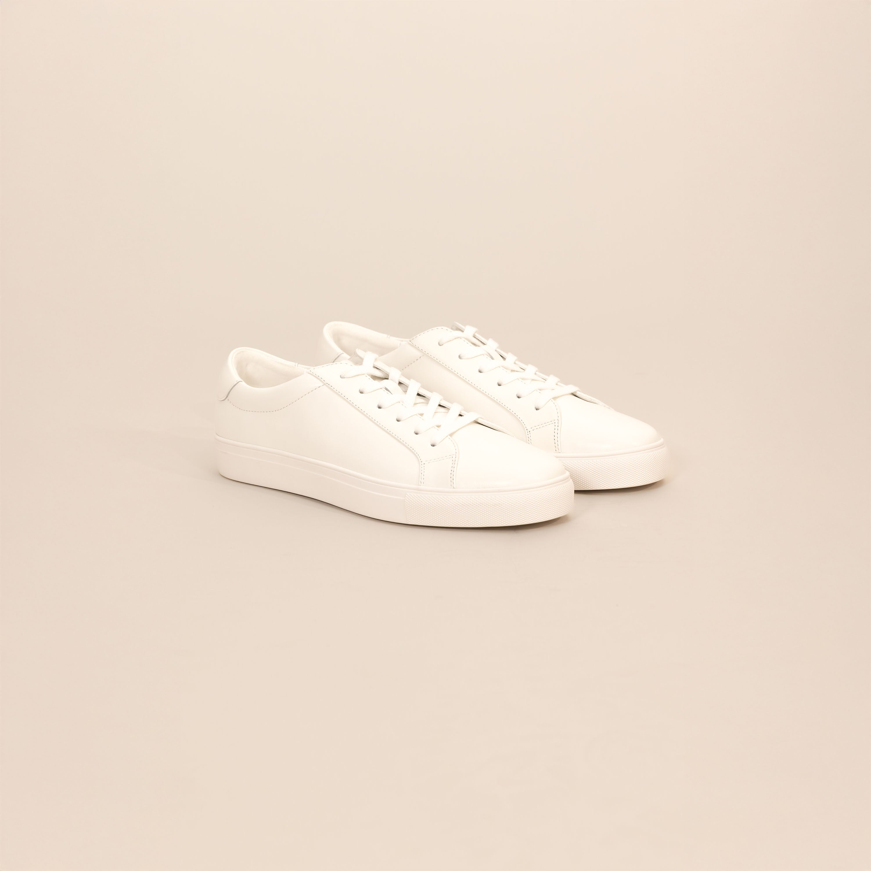 Marame Smart Leather Trainers in White, front view.