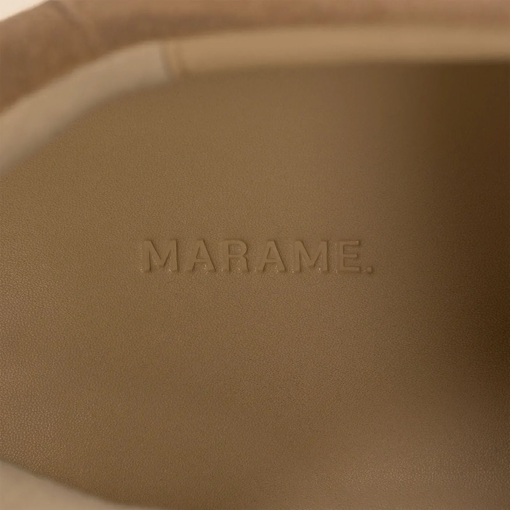 Marame Smart Suede Trainers in Sandstone, closeup.|sandstone