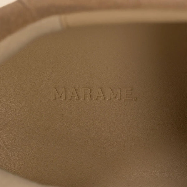 Marame Smart Suede Trainers in Sandstone, closeup.