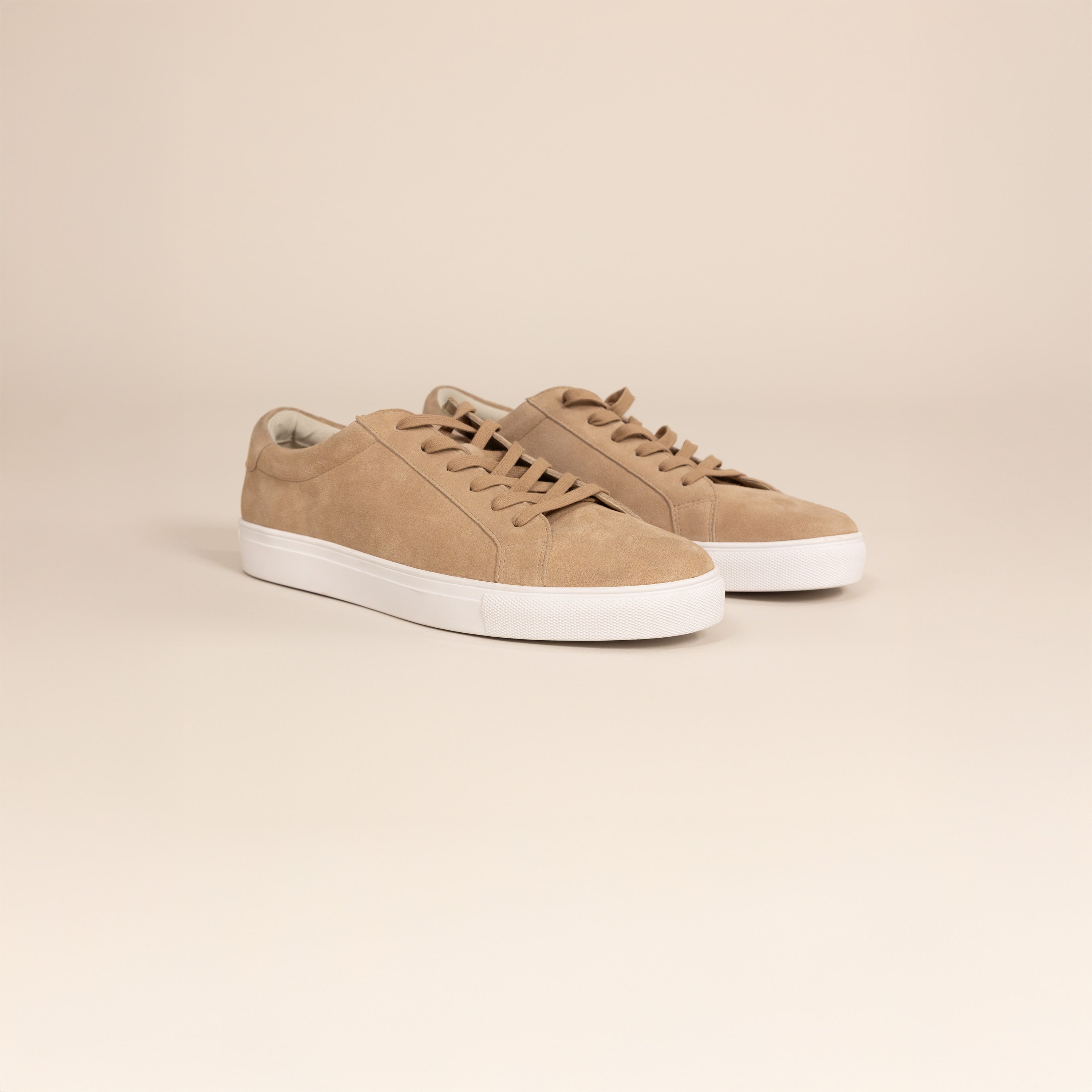 Marame Smart Suede Trainers in Sandstone, front view.